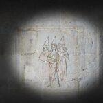 Characters with pointed hats from the "The Enigma of Pierre" exhibition by Picta Productions and Marelle Studio in 2023